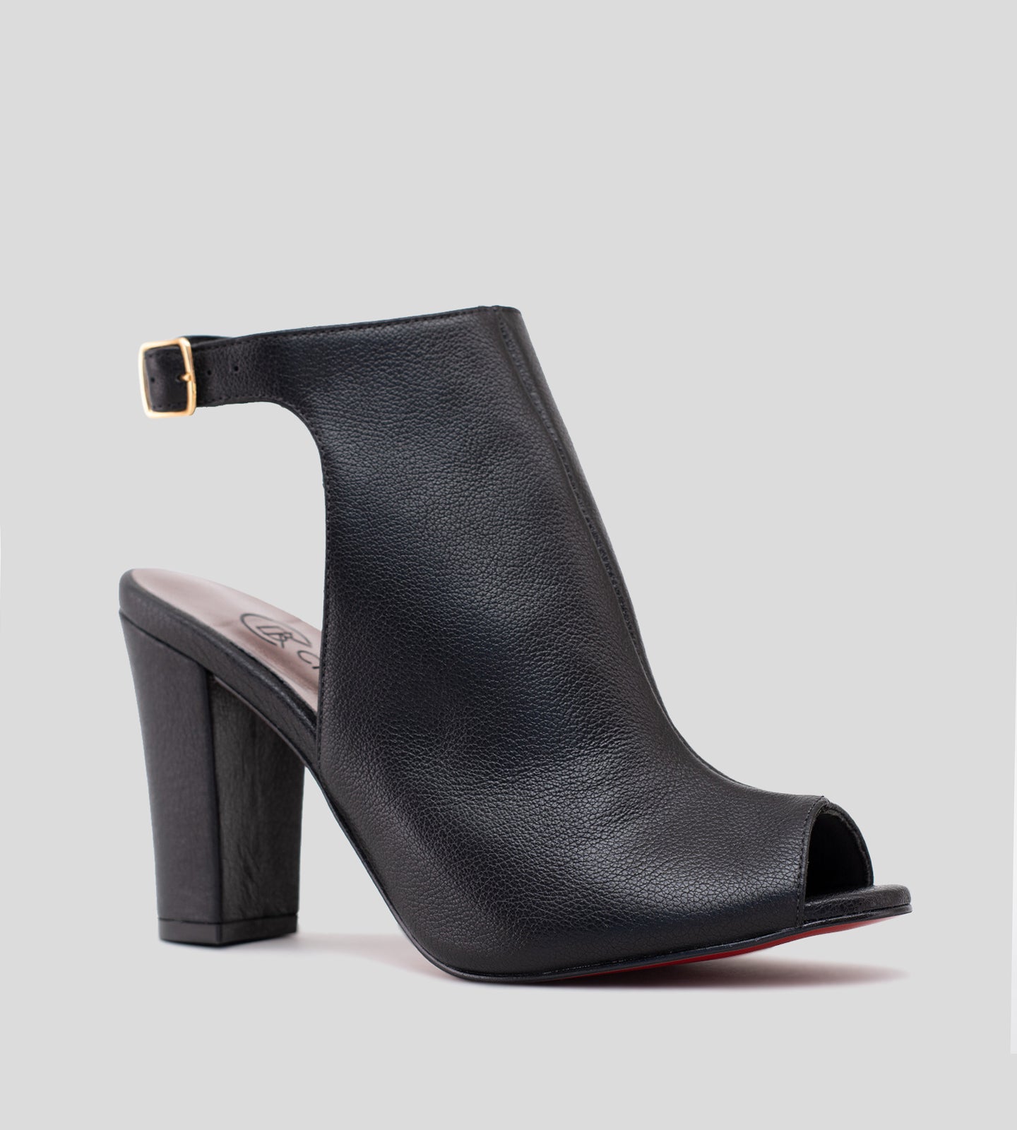 Sandália Ankle Boot em Couro Legítimo Preto com Salto de 10 cm e Solado Vermelho